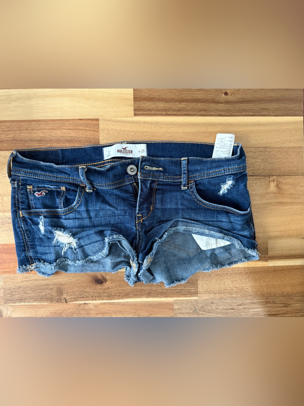 Hollister Women’s Distressed Dark Blue Denim Cutoff Shorts